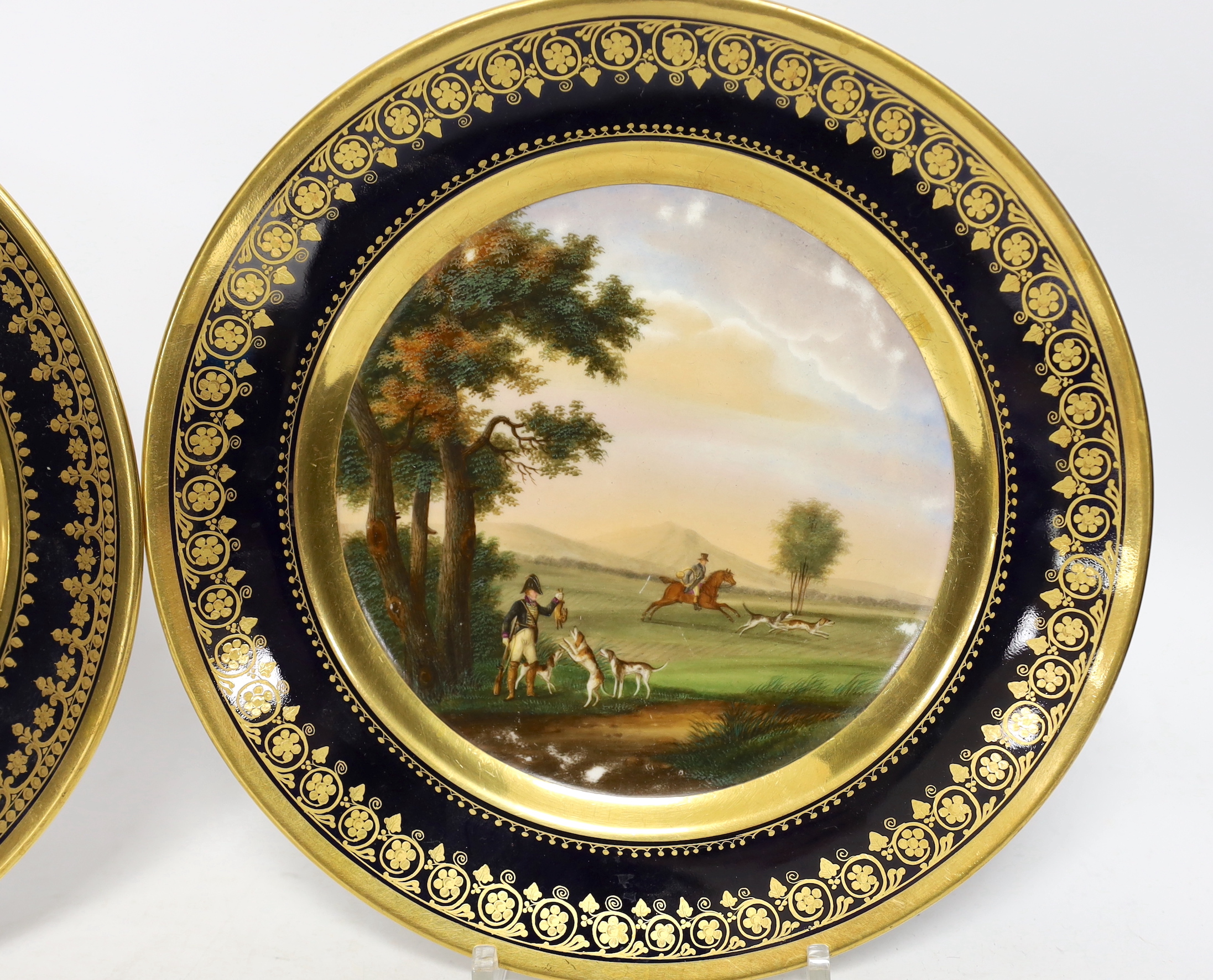 Two Paris porcelain Darte Palais Royal plates, c.1820 hand-painted hunting scenes, 23cm diameter